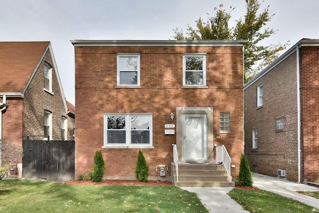 view of front of property featuring a front lawn