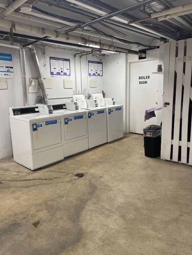 laundry room with washing machine and clothes dryer