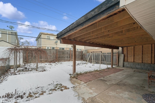 view of snow covered patio