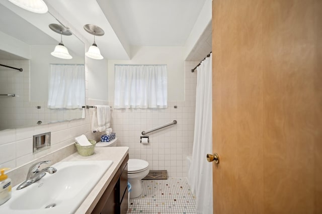 full bathroom with tile walls, tile patterned flooring, vanity, toilet, and shower / bathtub combination with curtain