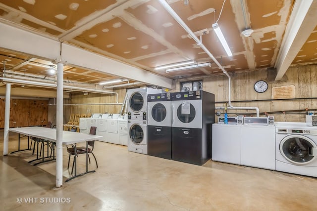 laundry room featuring separate washer and dryer and stacked washer / drying machine