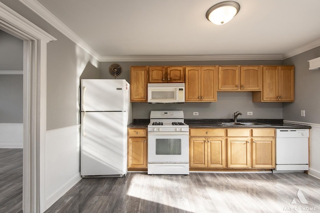 kitchen with white appliances, ornamental molding, sink, and wood-type flooring