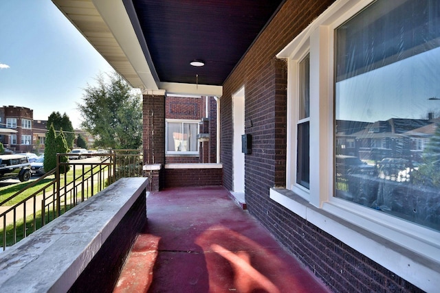 balcony featuring covered porch