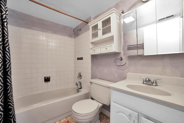 full bathroom with vanity, toilet, and shower / bath combo with shower curtain