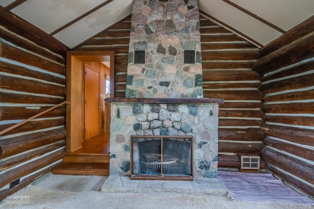 1026 State Route 25, Oswego, IL 60543 - unfurnished living room featuring visible vents, vaulted ceiling, and a stone fireplace