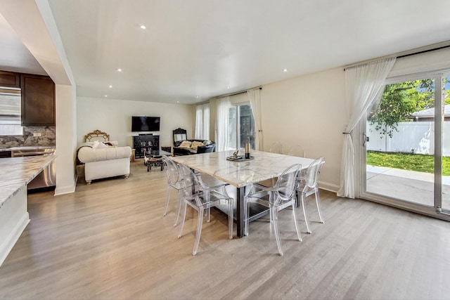 dining space featuring light hardwood / wood-style flooring