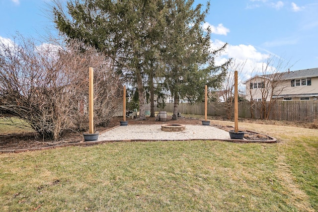 view of yard featuring an outdoor fire pit