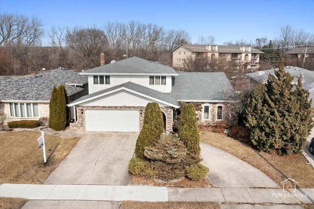 front of property with a garage