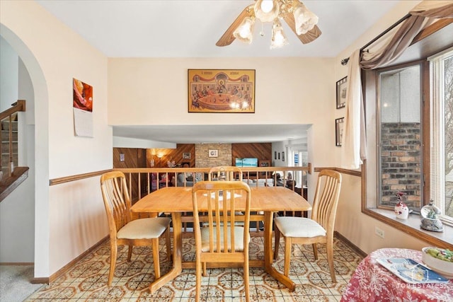 dining space featuring ceiling fan