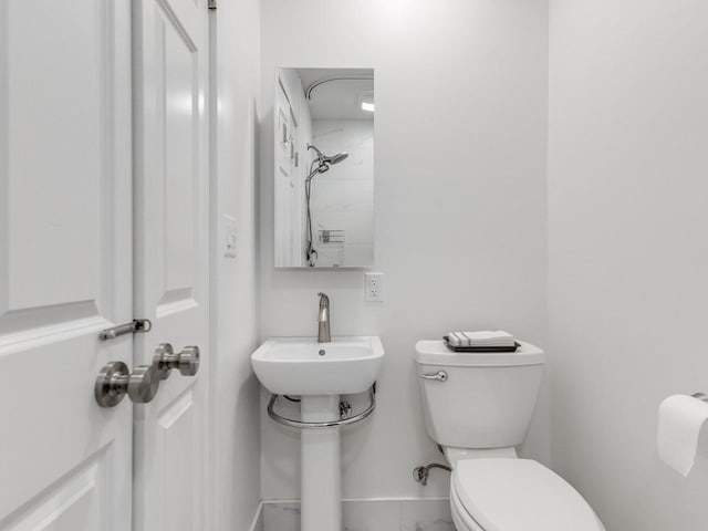 bathroom featuring toilet