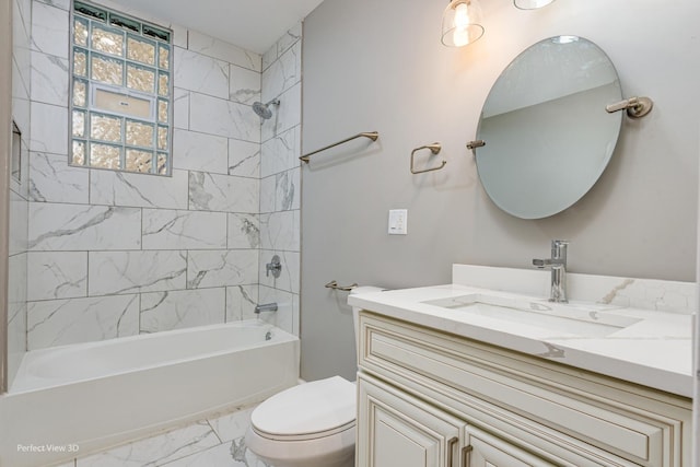 full bathroom featuring tiled shower / bath combo, vanity, and toilet