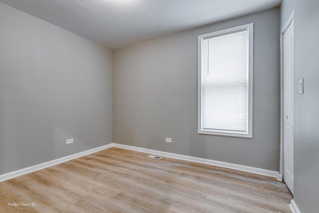 empty room with light wood-type flooring