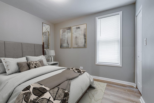 bedroom featuring light hardwood / wood-style flooring