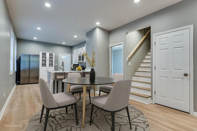 dining room featuring light wood-type flooring