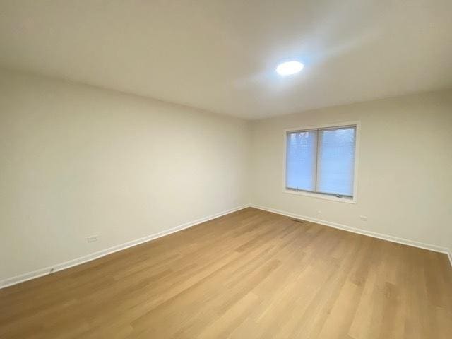 empty room featuring light wood-type flooring