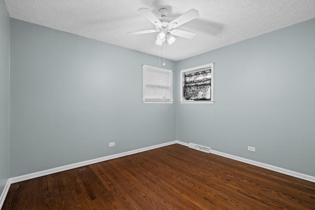 unfurnished room with hardwood / wood-style flooring, a textured ceiling, and ceiling fan