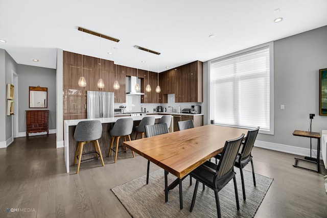 dining room featuring light hardwood / wood-style flooring