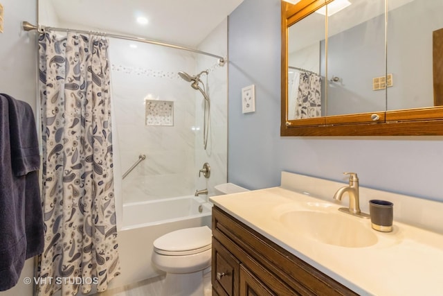 full bathroom featuring vanity, shower / bath combination with curtain, and toilet