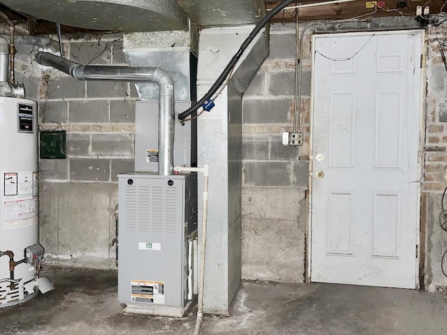 utility room with gas water heater