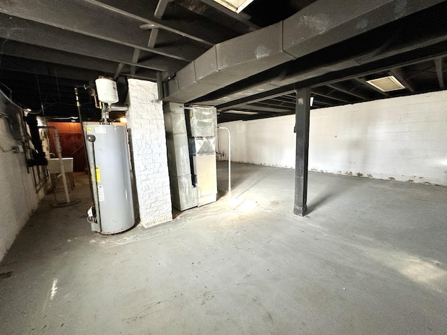 basement with heating unit and gas water heater