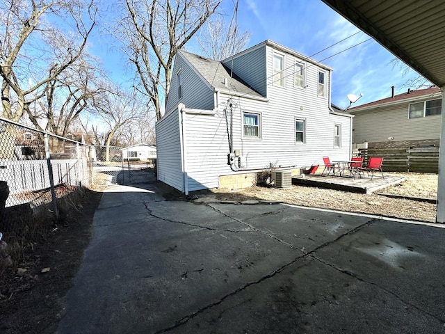 rear view of property featuring a patio