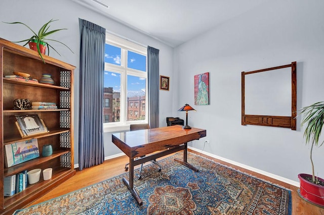 office space featuring light hardwood / wood-style floors