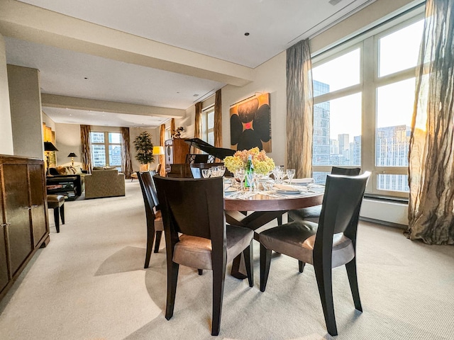 dining area with light carpet