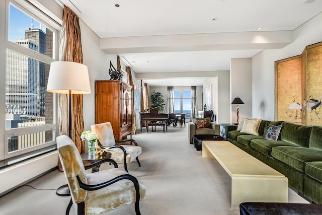 living room with carpet and beam ceiling