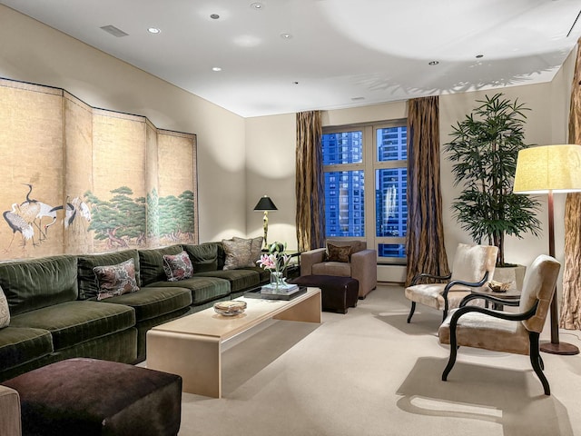 living room featuring light carpet and a baseboard radiator