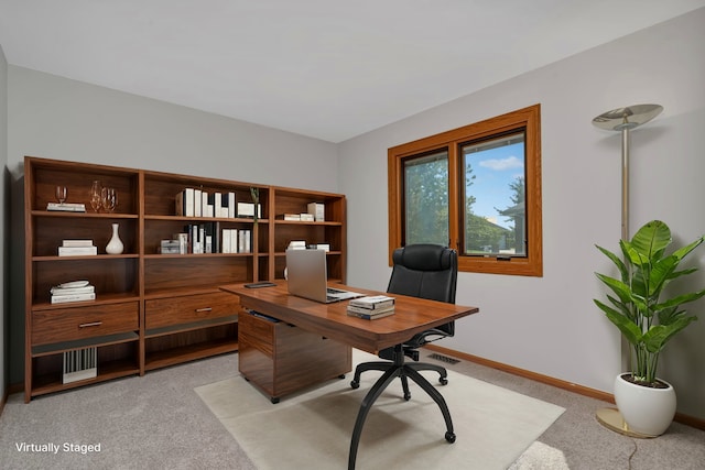 office area with light colored carpet