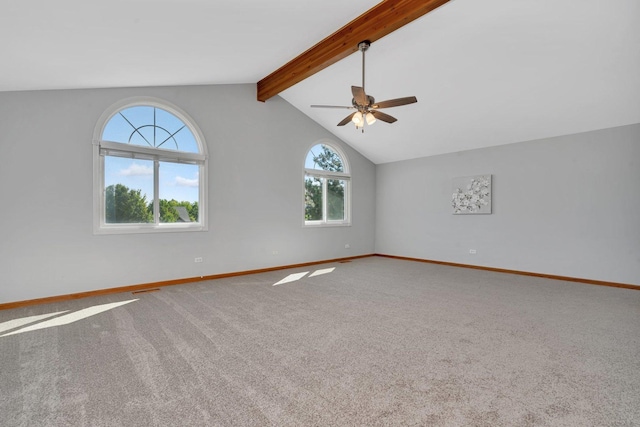 interior space with lofted ceiling with beams, ceiling fan, and carpet