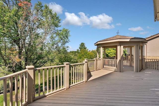 wooden deck featuring a gazebo