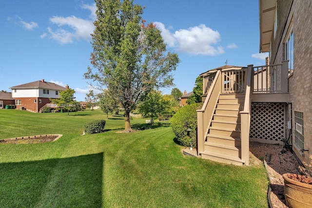 view of yard with a wooden deck