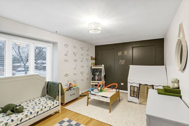 bedroom featuring hardwood / wood-style floors