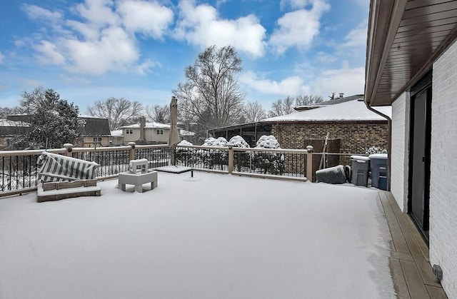 view of snow covered patio