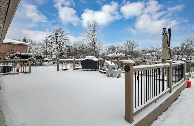 view of snow covered patio