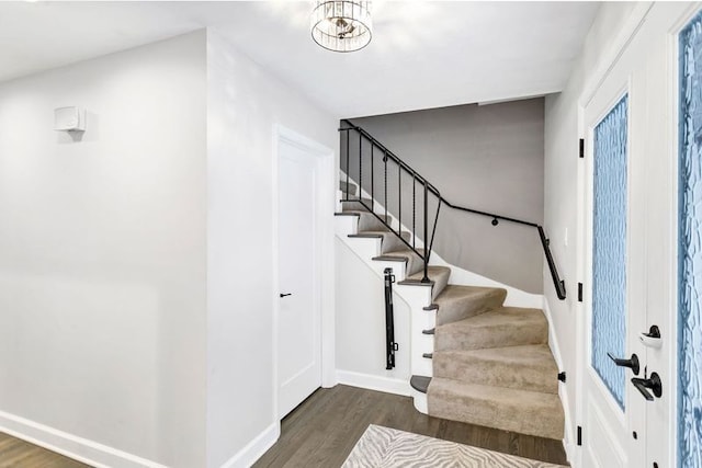 interior space with hardwood / wood-style floors and a chandelier