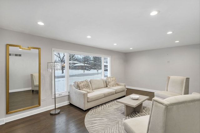 living room with dark wood-type flooring