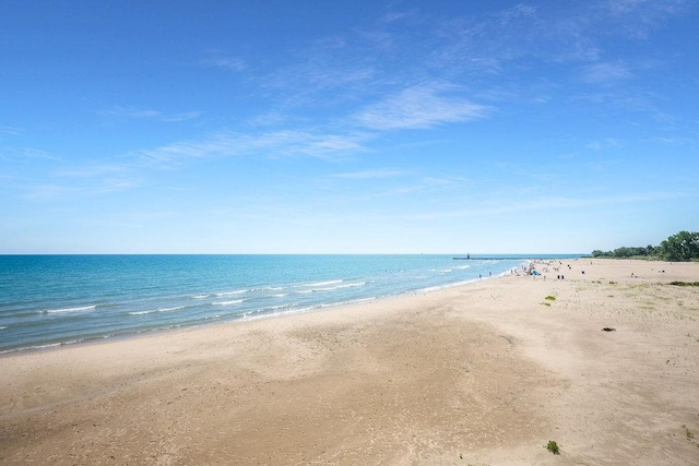 property view of water with a beach view