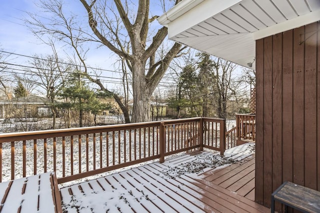 view of snow covered deck