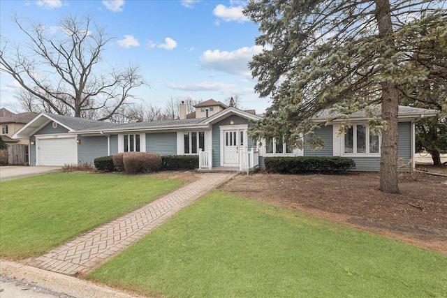 single story home with a garage and a front yard