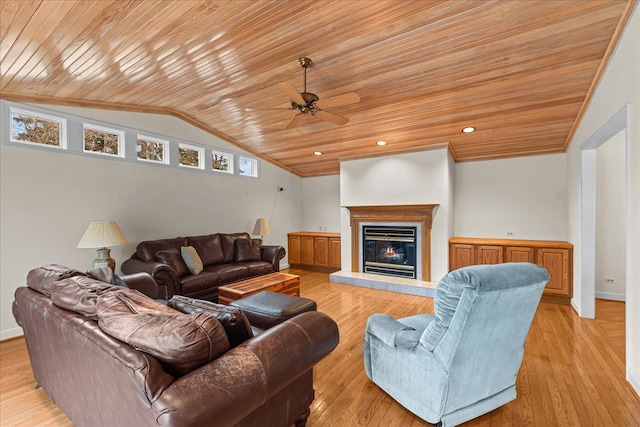 living room featuring crown molding, lofted ceiling, light wood-type flooring, and wooden ceiling