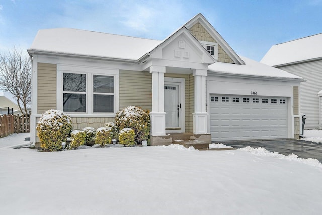 view of front of property with a garage