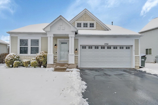 view of front of property with a garage