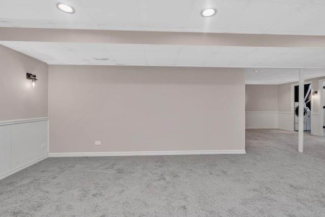 basement with carpet flooring