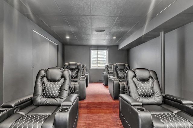 home theater with a paneled ceiling