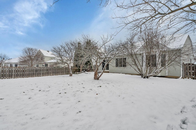 view of yard covered in snow