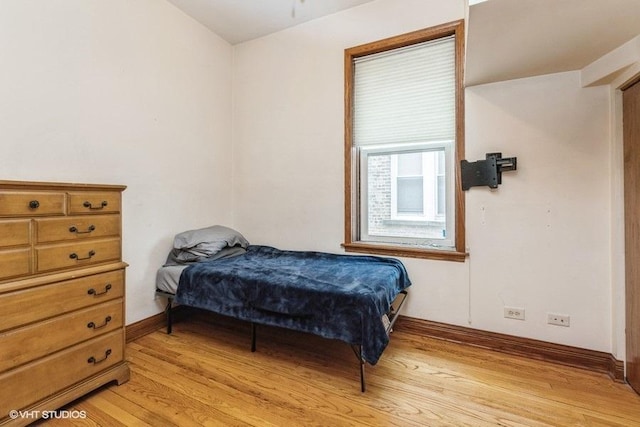 bedroom featuring light hardwood / wood-style floors