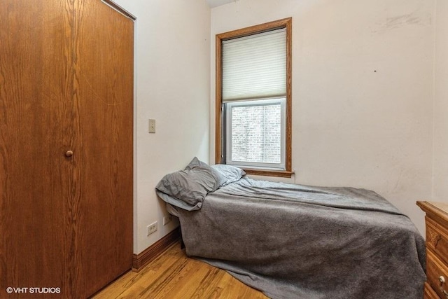 bedroom featuring light hardwood / wood-style floors