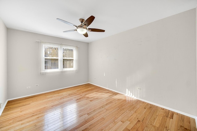 unfurnished room featuring light hardwood / wood-style flooring and ceiling fan